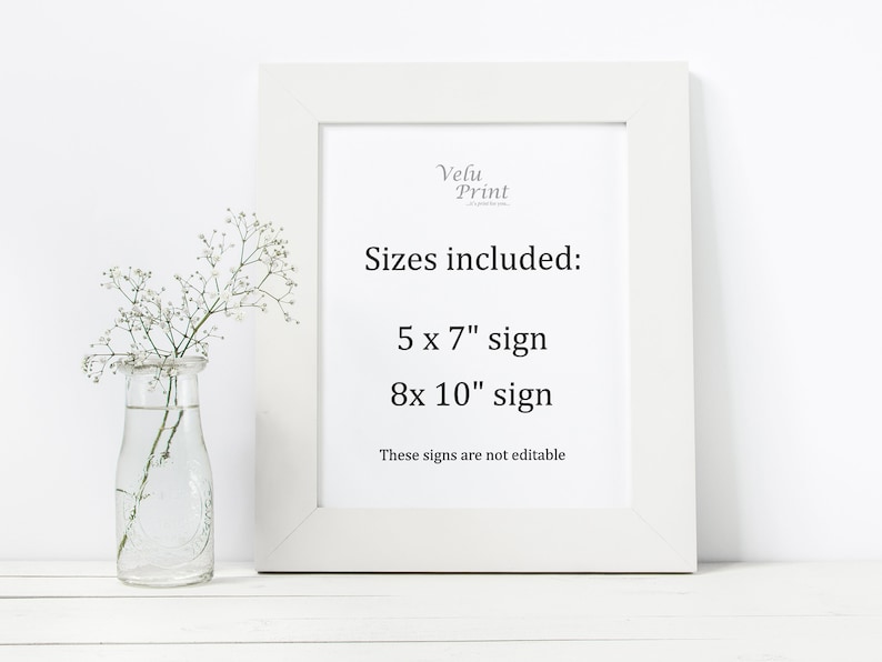 Peut inclure: Un cadre blanc avec un panneau imprim&eacute; &agrave; l'int&eacute;rieur. Le panneau indique "Velu Print" et liste les tailles incluses : 5 x 7" et 8 x 10". Le texte indique &eacute;galement "Ces panneaux ne sont pas modifiables".