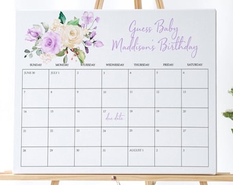 May include: A white calendar with a floral design and the text "Guess Baby Maddison's Birthday." The calendar grid is filled with dates, with "due date" written on July 17th. The design includes purple and cream-colored flowers.
