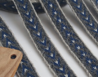 Tablet woven wool trim. Viking reenactment. Gray, light gray, blue and white.