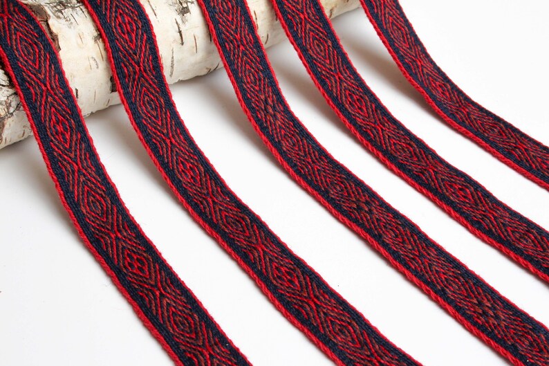 Dark blue Viking reenactment red and brown. Tablet woven wool trim