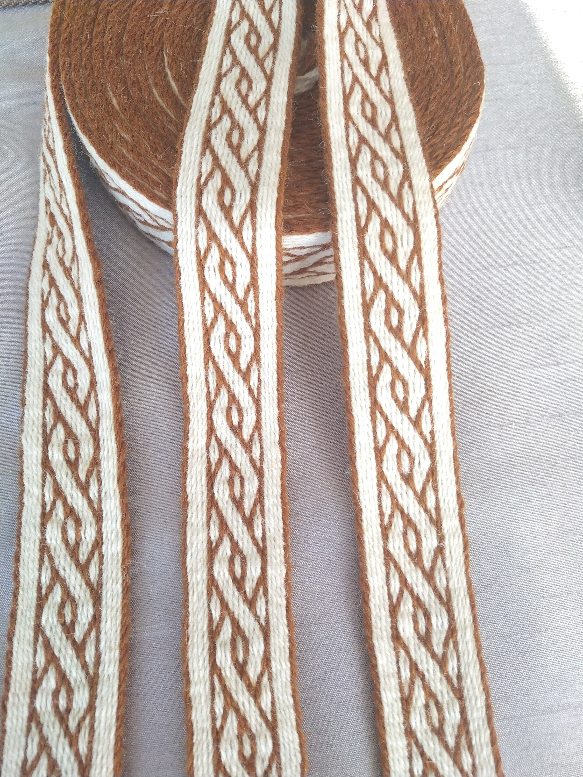 Tablet woven wool trim. Viking reenactment, medieval historical braid. Brown and white.