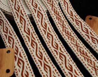 Tablet woven wool trim. Viking reenactment. White and brown.