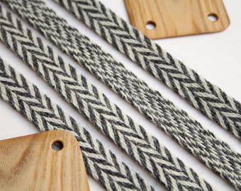 Tablet woven wool trim. Viking reenactment. Gray and white.