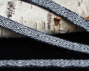 Tablet woven wool trim. Viking reenactment. Blue and white.