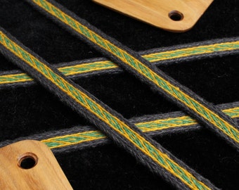 Tablet woven linen trim. Viking reenactment, medieval historical braid. Black, green and yellow.