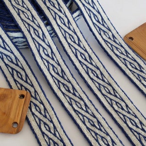 Tablet woven wool trim. Viking reenactment, medieval historical braid. Blue and white.
