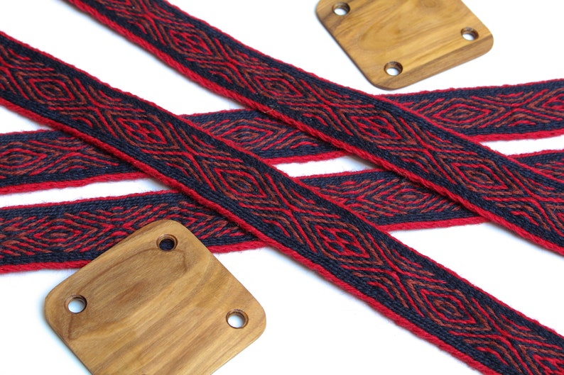 Dark blue Viking reenactment red and brown. Tablet woven wool trim