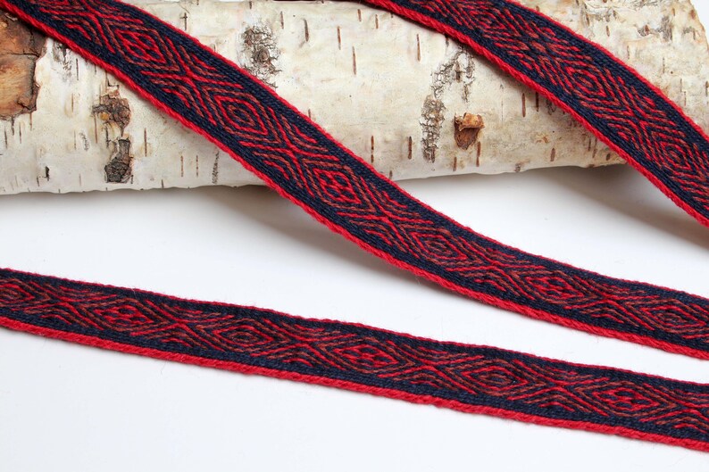 Dark blue Viking reenactment red and brown. Tablet woven wool trim