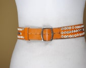 Orange studded leather belt