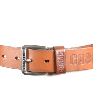Vintage CASOIL Brown Leather Belt: Embossed Logo, Silver Buckle