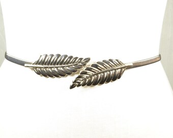 Cintura elastica con fibbia a foglia vintage in metallo color argento