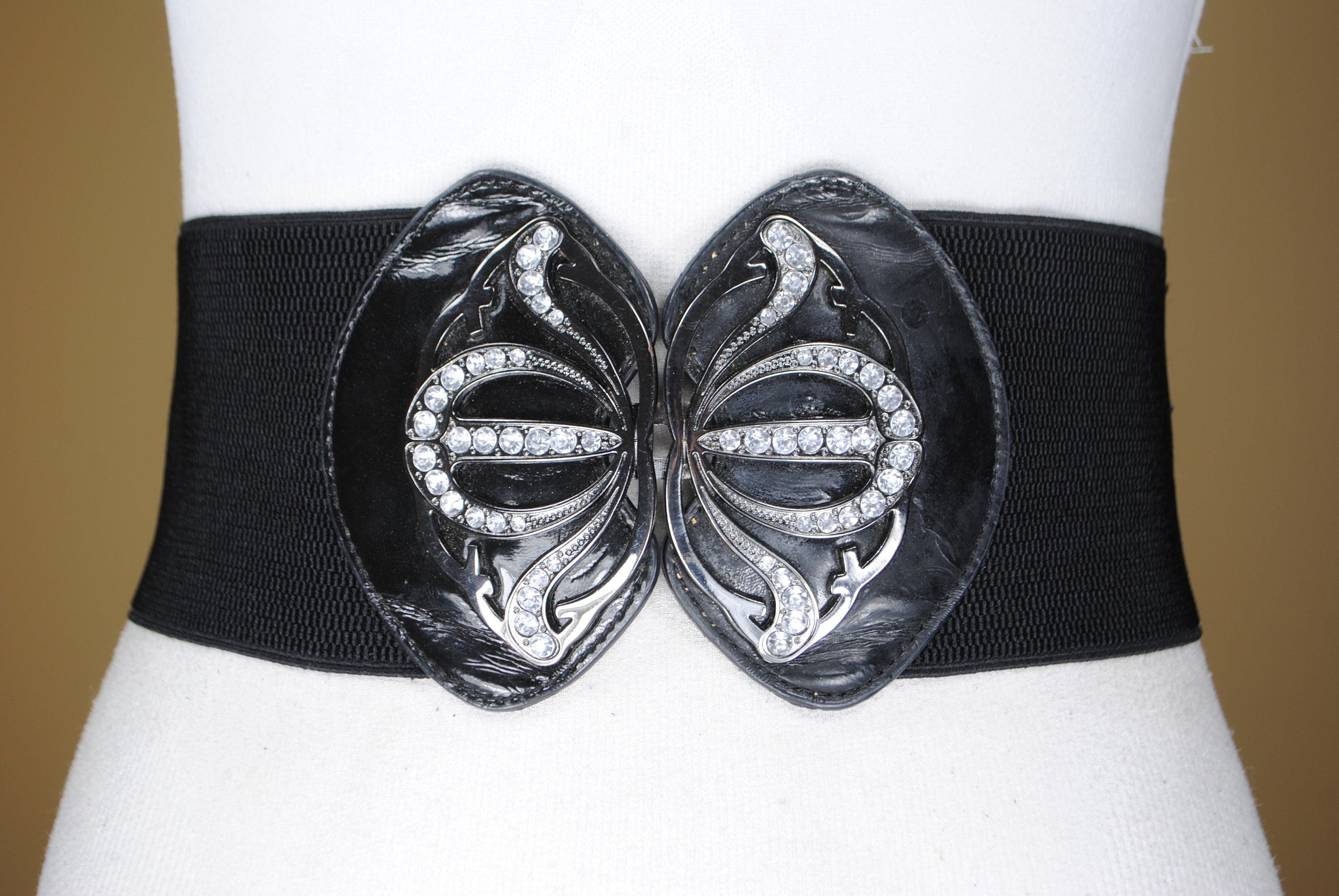 Black elastic belt with silver buckle clearance