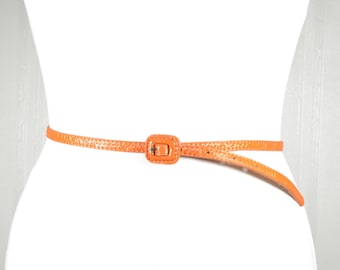 Vintage Orange Patent Leather Skinny Belt: Retro Chic Waist Accessory