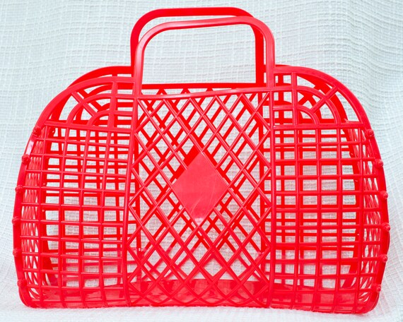 red plastic market bag grocery tote