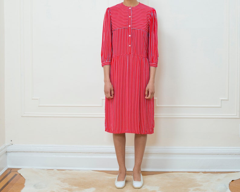 red and blue striped dress