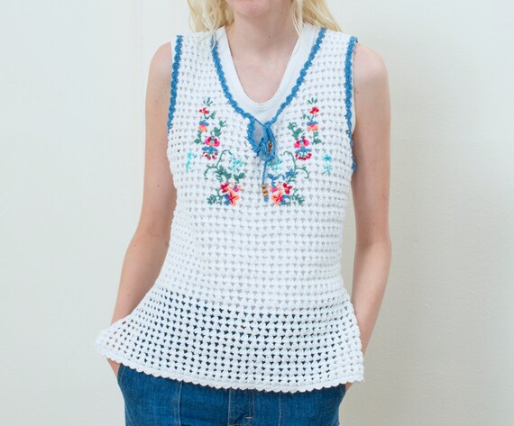 white crochet vest