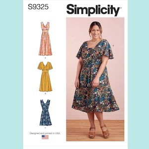 May include: Simplicity sewing pattern S9325. The image shows a woman wearing a floral print dress. The pattern includes illustrations of three different dress designs. The text "Designed and printed in USA" is visible.