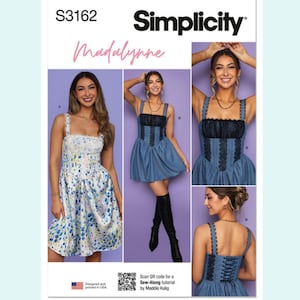 May include: Simplicity sewing pattern S3162 featuring a Madalynne design. The pattern includes images of a woman wearing a blue and white floral dress, and a denim dress with black lace detailing. The pattern is designed and printed in the USA.