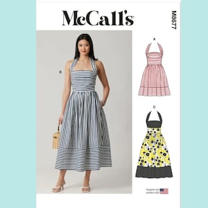 May include: McCall's M8677 sewing pattern envelope featuring a halter-neck dress with a full skirt. The main image shows a blue and white striped dress. Two additional illustrations show a red striped version and a yellow floral version.