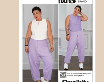 May include: Two images of a person wearing a white top and lavender pants, and a lavender top and lavender pants. The Simplicity pattern package is visible, with the text "S9754", "miG", and "Simplicity". The package also includes a QR code.