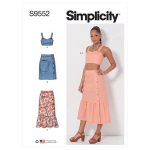 May include: A sewing pattern for a two-piece outfit, featuring a crop top and a skirt. The pattern includes three different skirt styles: a denim skirt, a floral skirt, and a solid pink skirt. The pattern is called Simplicity S9552.
