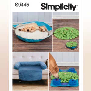 May include: A sewing pattern for a pet bed and a dog puzzle toy. The pattern is from Simplicity and the pattern number is S9445. The pet bed is blue and has a bolster. The dog puzzle toy is green and has a blue border.