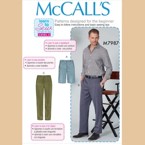 May include: McCall's sewing pattern for Level 2 beginners. The image shows a man wearing a gray shirt and blue pants. The pattern includes instructions for sewing a waistband, pockets, and a fly zipper. The pattern number is M7987.