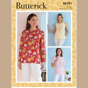 May include: A Butterick sewing pattern featuring three different blouse designs. The image shows a red floral long-sleeve blouse, a yellow sleeveless top, and a pink polka-dot short-sleeve blouse. The pattern number is B6751.