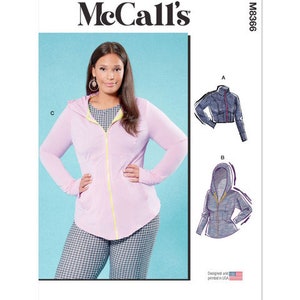 May include: McCall's sewing pattern M8366 for a hooded jacket with a zipper closure. The pattern includes three different styles: a cropped jacket, a longer jacket with a hood, and a longer jacket with a hood and a contrasting zipper. The pattern is designed and printed in the USA.