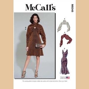 May include: McCall's sewing pattern M8348 featuring a woman in a brown dress with a keyhole neckline, holding a clutch. Additional views include a bolero and a leopard print dress. The text reads "Designed and printed in USA."