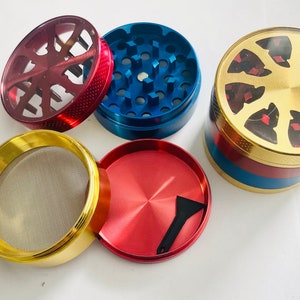 2.25" Large Clear Top 4 Part Titanium Metal Tobacco Spice Herb Grinder Crusher Cleaning tool Included in Assorted Colors