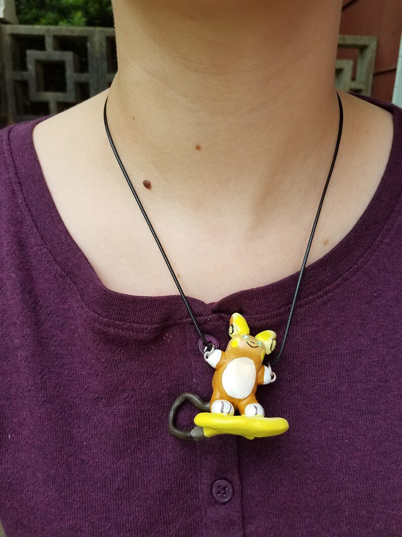 Surfing Raichu necklace