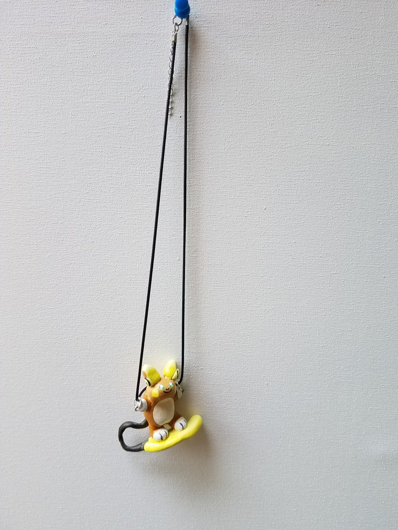 Surfing Raichu necklace