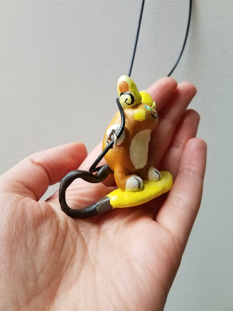 Surfing Raichu necklace
