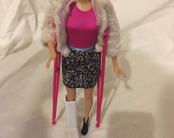 barbie with crutches