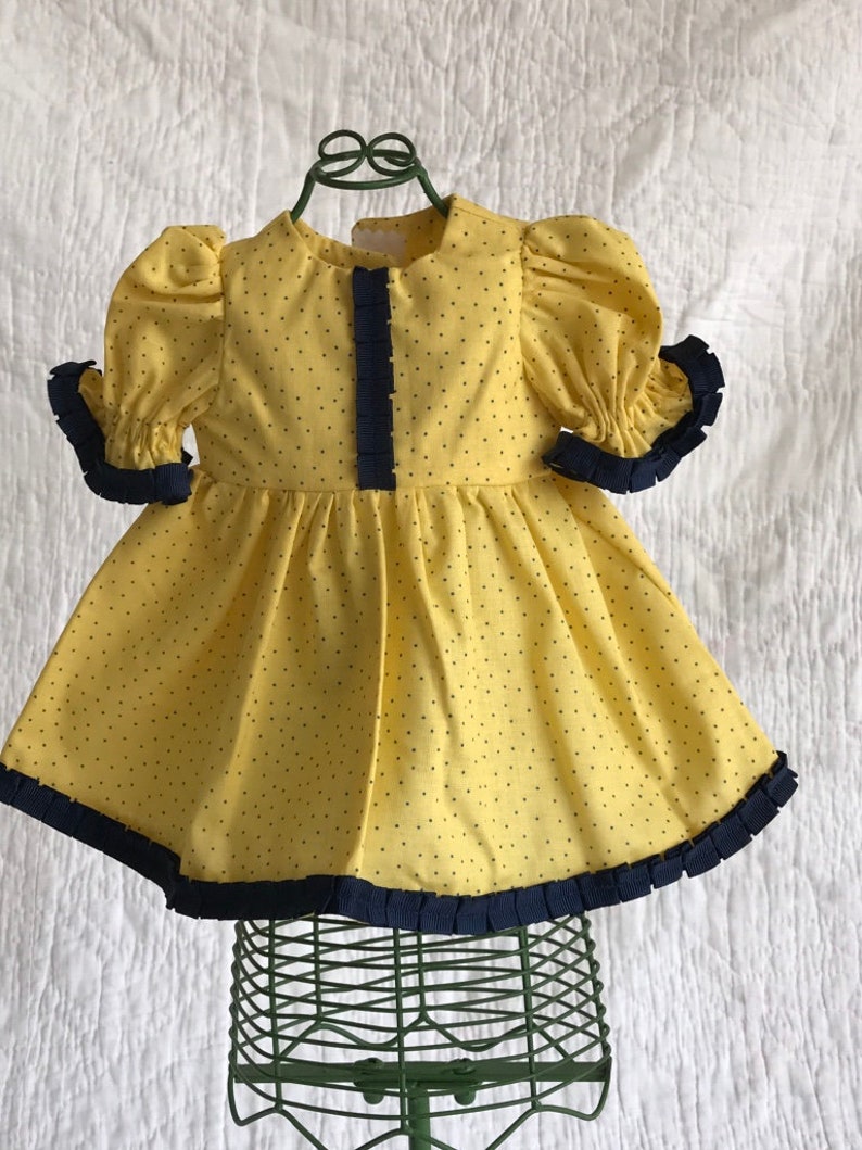 navy and yellow polka dot dress