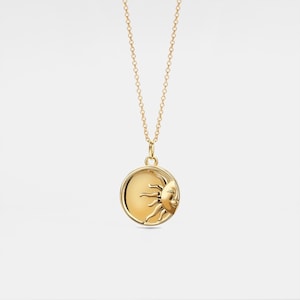 Gold locket sun sale