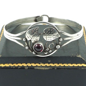 Arts & Crafts Style Silver Bangle set with Garnet, Decorated with Leaves
