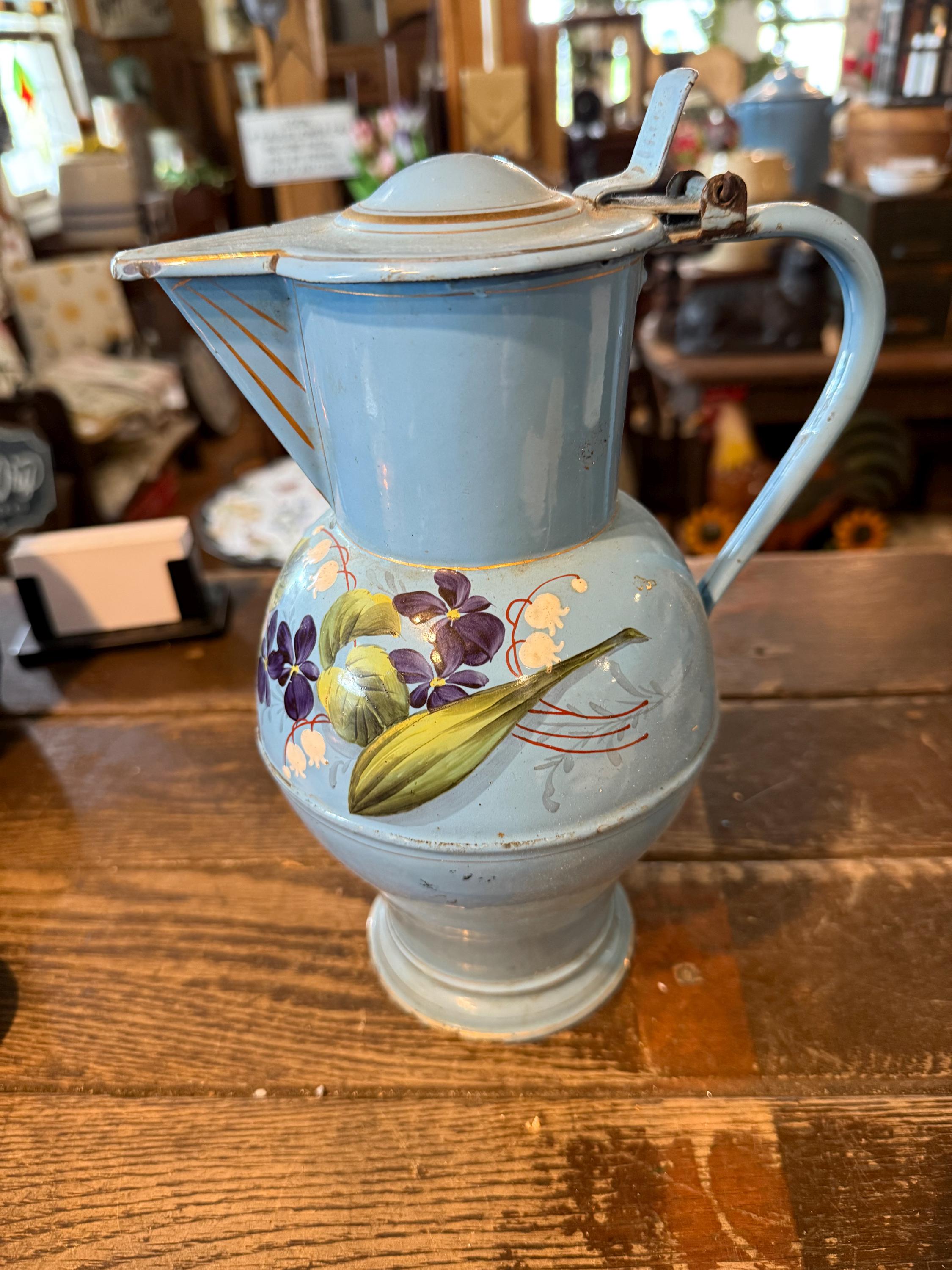 Antique European blue enamelware coffee kettle with hand painted flowered design