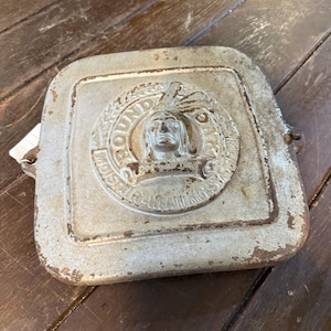 Antique cast iron round oak door for a wood stove or antique heater.