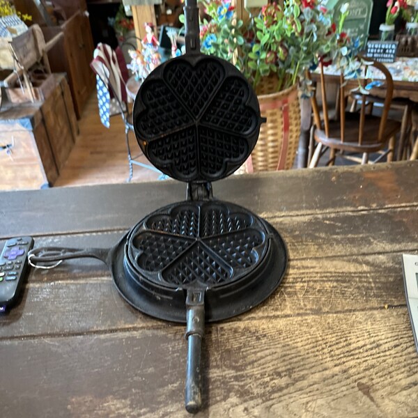 Antique Alfred Anderson cast iron heart shaped waffle iron.