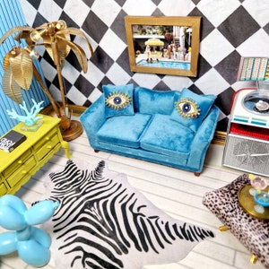 Blue velvet dollhouse sofa for a modern 12th scale dollshouse, diorama or roombox with embellished Jewel eye cushions