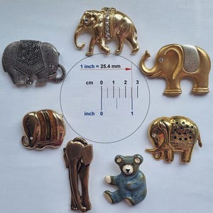 Set of old vintage brooches mixed styles sizes designs old elephant bear brooch bundle collection retro accessories quantity 7 pieces