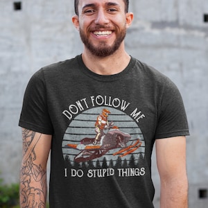 Funny Snowmobile T-Shirt Snowmobiling Gift Don&#39;t Follow Me I Do Stupid Things Snowmobiler Shirt Unisex Winter Sports Print Tee Adult Kids