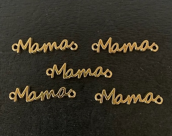 May include: Five gold metal charms spelling out the word "Mama" in a cursive font.