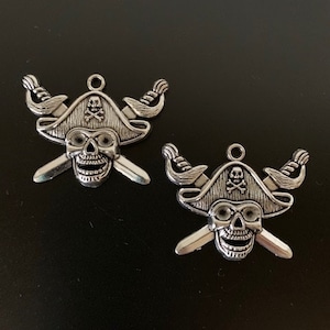2 silver pirate charms, metal charms, metal pendant, pirate charms, pirate pendant, skull charm, skull pendant, sword charm, Halloween charm