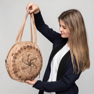 Round sling bag under 300 on sale