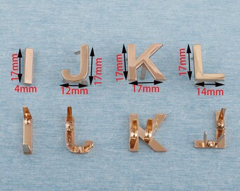 Etichetta per borsa con lettera inglese in metallo color oro