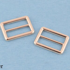 4 st metallspänne med trippelglidning: 32 mm väskremsjustering Silver
