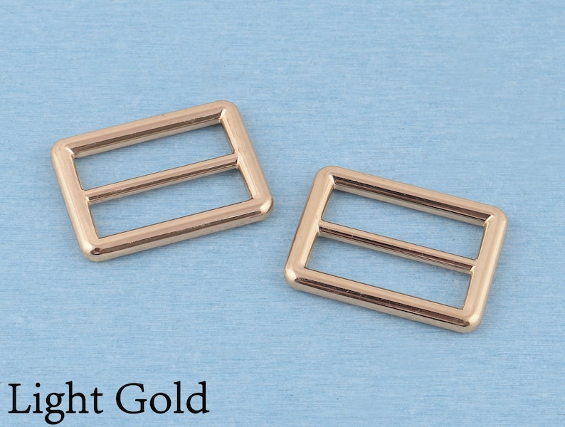 4 st metallspänne med trippelglidning: 32 mm väskremsjustering Light Gold
